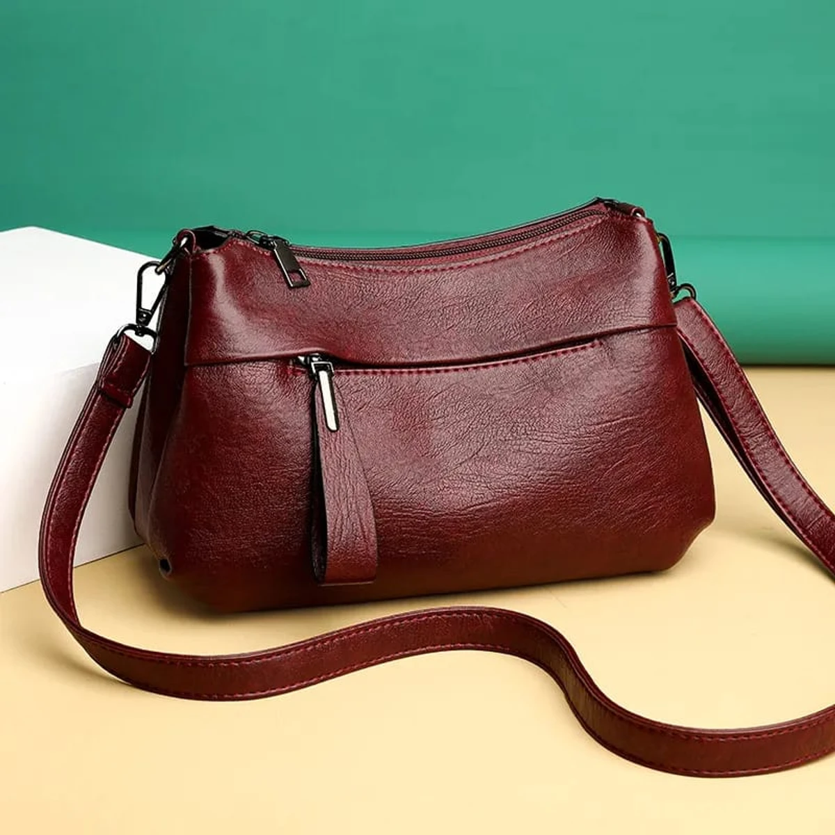 Crossbody bag atipasial leather ( maroon color )